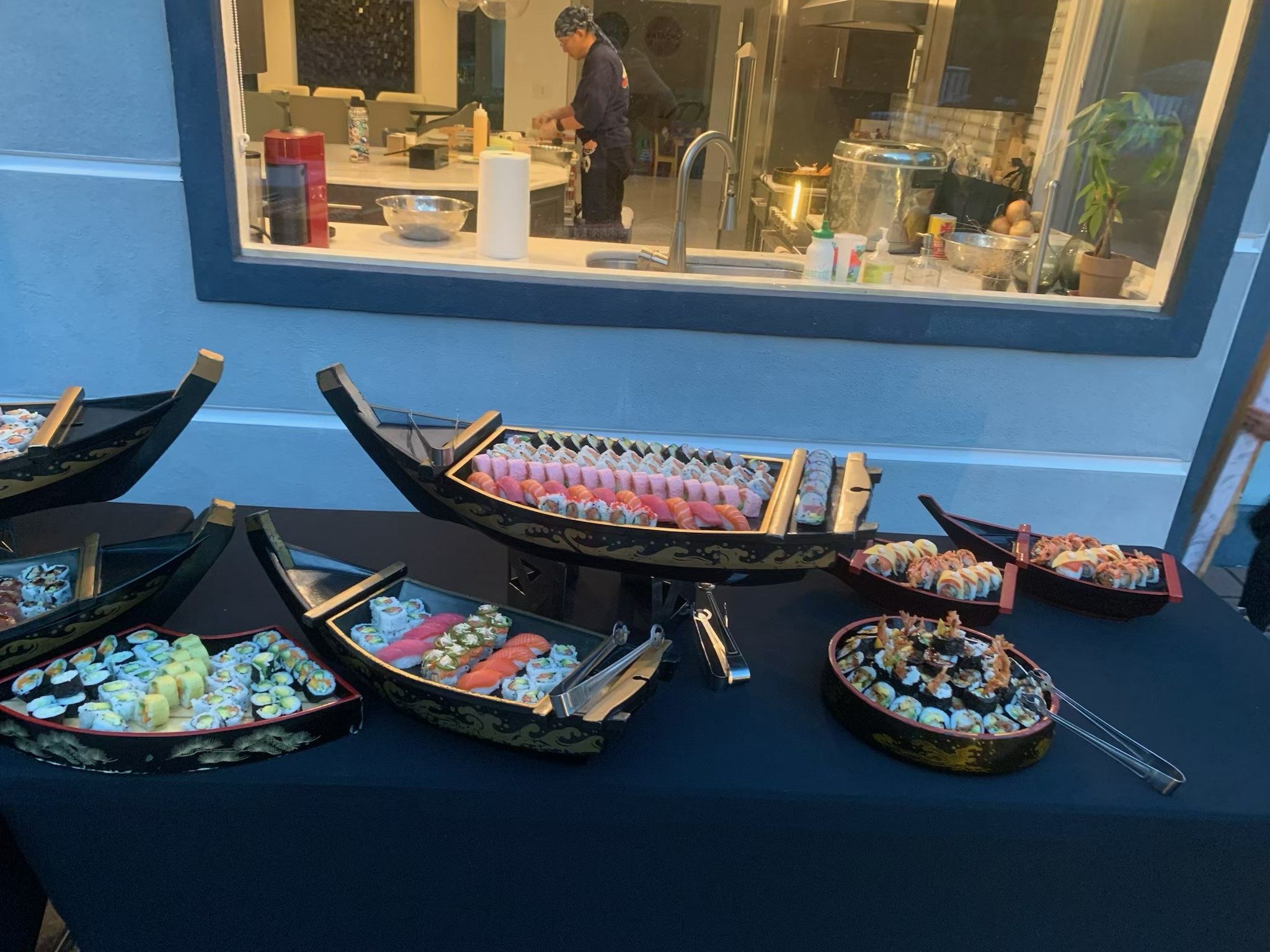 Elegant sushi display arranged on glass serving platters